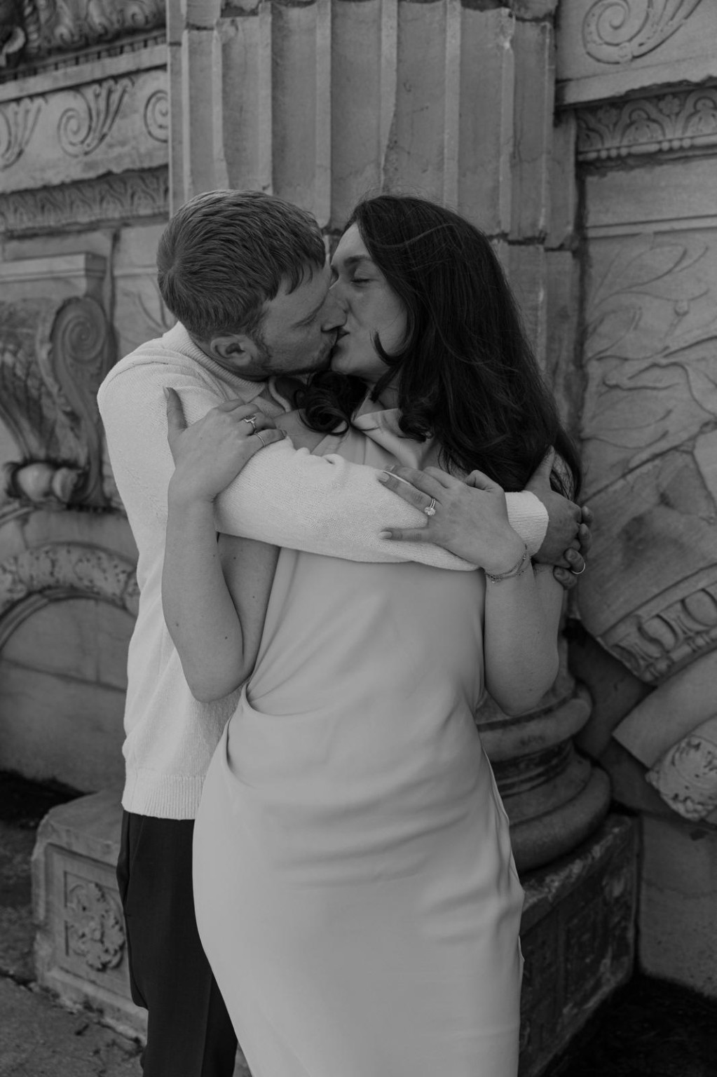 Black and white engagement portrait of Maria and Cole